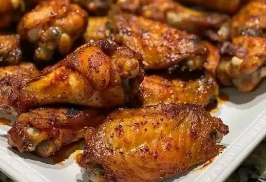 Spice up your snack game with these perfectly crispy, mouth-watering chicken wings — finger-licking good every time!