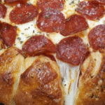 A hearty, cheesy casserole with all your favorite pizza toppings.